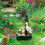 Fonteinbeeld van een eendenfamilie van hars voor in de tuin 4