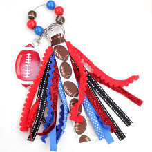 Porte-clés sportif avec un design créatif de rugby et des-10