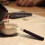 Tea Pot Clip with Wooden Handle and Cast Iron Head 5