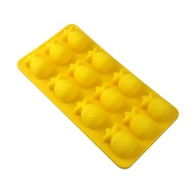 Forma de silicone amarela para doces em formato de abacaxi, própria para alimentos.