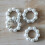 Perlen-Serviettenringe mit silbernen Strassblumen, 12er-Set 2