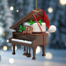 Orangefärgad minipianodekoration till jul