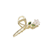 Bloemvormige haarclips, metalen gouden haarbanden, haaraccessoires, haarspeldjes met klauwen, haarversieringen.
