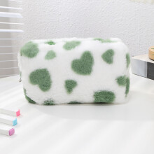 Grote, schattige make-uptas in groen