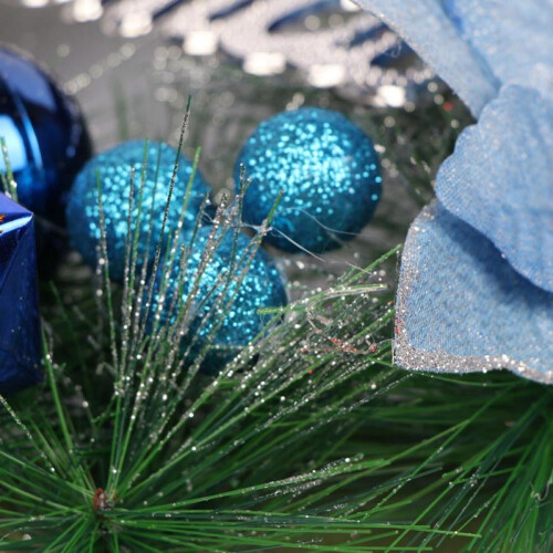 Christmas pine wreath with blue bow and ornaments 1
