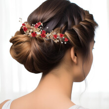 Peineta nupcial con flor roja y detalles de cristal
