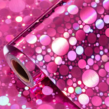 Rolle Geschenkpapier mit rosa holografischen Punkten