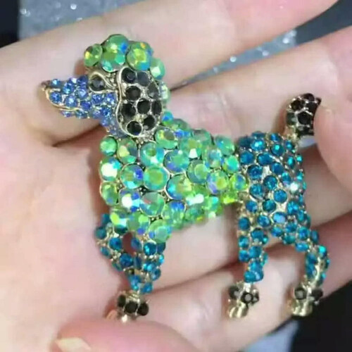 Broche de cachorrinho em bronze com diamante e formato de laço. 2