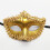 Masque vénitien doré orné de perles et de strass 1