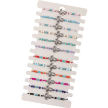 Handgemaakte, verstelbare armband met schildpadmotief en turkooizen details.
