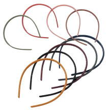 Set di 9 fasce per capelli in plastica di colori assortiti per donna