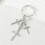 Sturdy Metal Crucifix Keychain Decorated with Sparkling 7