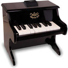 Piano in legno con spartiti