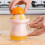 Manual Lime Squeezer with Measuring Cup and Strainer 4