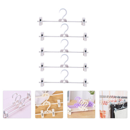 Set van 5 witte plastic broekclips 1