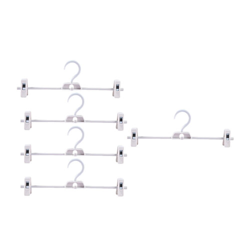 Set van 5 witte plastic broekclips 2