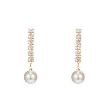 Boucles d'oreilles à pompons longs avec perles et zircon en