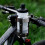 Suporte universal 2 em 1 para copo e celular, ideal para carrinho de bebê e bicicleta. 1