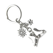 Skiing And Skating Inspired Keychain Featuring Snowflake And Ice