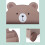 Estante infantil com tema de urso, com rodinhas e espaço para guardar livros. 6