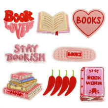 Toppe ricamate termoadesive a tema libri (8 pezzi)