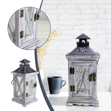 Farol de madera decorativo con vela para uso interior y exterior.