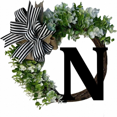 Puinen monogrammi-etuoven seppele pellavaisella rusetilla