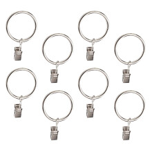 Juego de 36 anillas para cortinas chapadas en hierro plateado con clips.