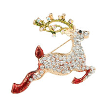 Conjunto de broches navideños con muñeco de nieve y árbol de Navidad con diamantes de imitación.
