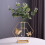 Künstliches Blumenarrangement in einer hydroponischen Glasvase 5