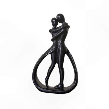 Abstracte harsfiguur van een stel, geschikt voor huisdecoratie, modern haardornament, stijlvolle Valentijnsdagdecoratie in zwart.