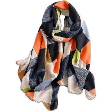 Zachte en lichte sjaal met geometrisch letterpatroon in gemengde kleuren, modieuze omslagdoek, makkelijk te combineren met kleding (oranje)