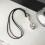 Collar moderno con dije de cuchara y cordón tejido a mano. 5