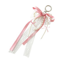 Fashionable Alloy Lace Bowknot Pendant Keyring With Flowing