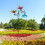 Cata-vento de metal com 3 flores e borboletas para jardim 6