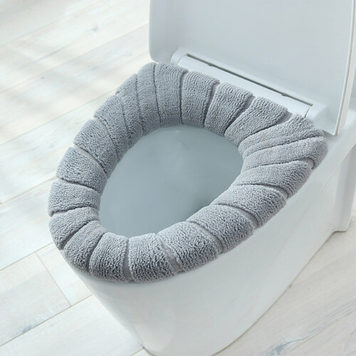 Protège-siège de toilette doux et épais, gris, extensible et lavable.