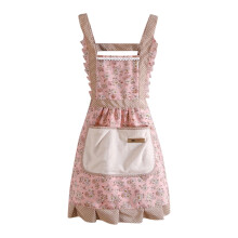Vintage-Küchenschürze mit Blumenmuster und Rüschenbesatz