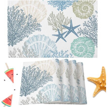 Set van 6 placemats met oceaan-, zeesterren- en koraalschelpmotief, gemaakt van katoen en linnen.