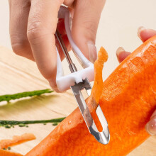 Éplucheur à légumes en acier inoxydable avec poignée ergonomique blanche