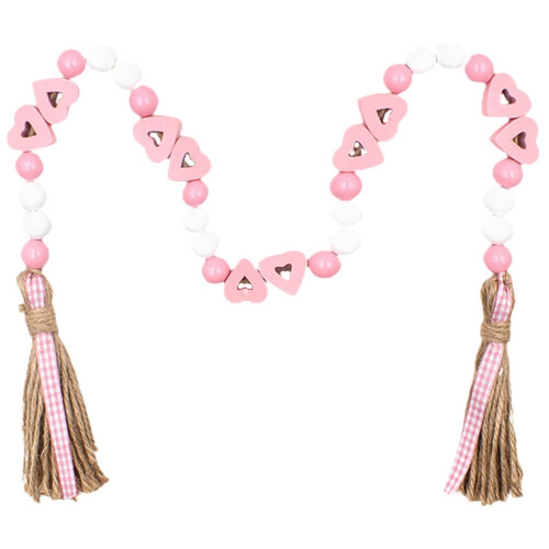 Guirnalda de cuentas de madera en forma de corazón con borlas – Rosa