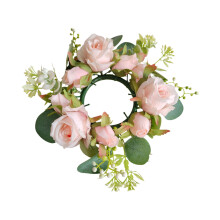 Couronne de bougie ornée de roses pour décoration de table