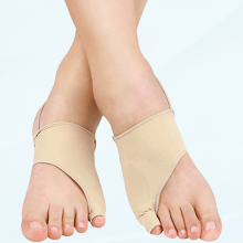 Rosa silikon skredderens hallux valgus-korrigerer med sklisikker stropp