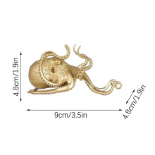 Soporte para teléfono con forma de pulpo en color dorado - Soporte metálico para móvil