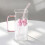 Eleganter quadratischer Glastrinkbecher mit Deckel,-Rosa 2