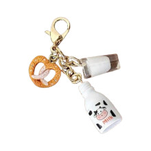 Llavero único con forma de pan de leche, monedero decorativo compacto hecho a mano, regalo ideal para amigos y familiares.