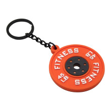 Llavero resistente al desgarro con temática de entrenamiento, fabricado en goma, con detalle de placa de barra de 45 lb, compatible con atletas.