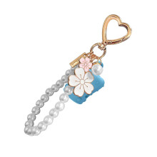 Funda para bálsamo labial con perlas de moda, llavero multifunción, práctico clip, adorno compatible con llaves o bolsos.