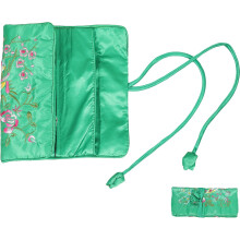 Estuche enrollable para joyas bordado a mano con cierre de lazo, brocado multicompartimento para cosméticos y joyas.