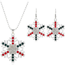 Conjunto de collar y pendientes de copo de nieve para Navidad. Delicado conjunto de joyería con diseño brillante de copo de nieve.