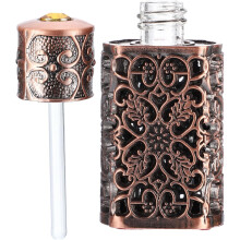 Flacon vaporisateur de voyage pour huiles essentielles 3 ml, en métal, étanche, avec gravure florale ajourée.